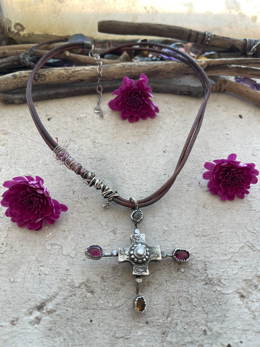 NECKLACE 31: STERLING SILVER LEATHER WITH HALLOW FORM CROSS AND RAINBOW TOURMALINE