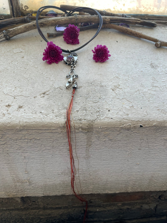 NECKLACE 33: LEATHER CHOKER WITH HALLOW FORM AND RAINBOW TOURMALINE, RED STRING AND HALLOW FORMS