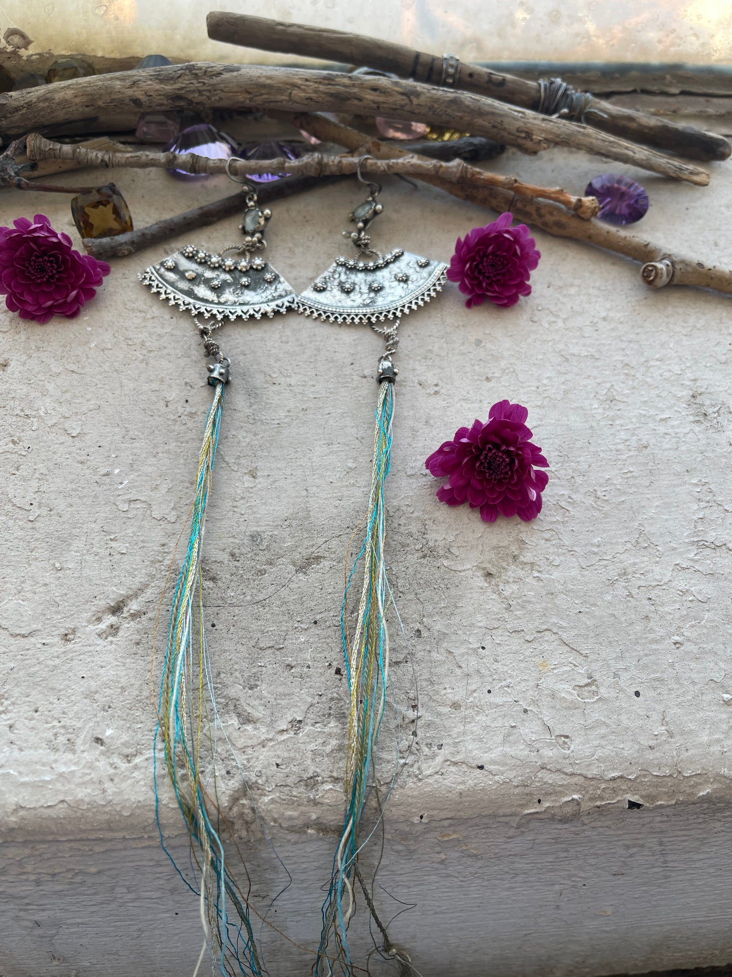 EARRING 81: STERLING SILVER HAMMERED TEXTURE WITH 1 GEM AND BLUE STRING